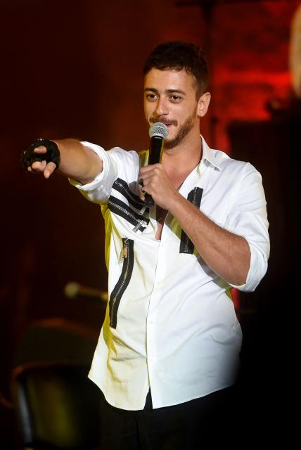(FILES) Morocco singer Saad Lamjarred performs during the 52 sesion of the International Carthage Festival on July 30, 2016 at the Roman theatre of Carthage near Tunis. Moroccan singer Saad Lamjarred was sentenced on May 15, 2026 to five years in prison by the Draguignan Assize Court for the rape of a young woman he met in Saint-Tropez in 2018. (Photo by FETHI BELAID / AFP)
