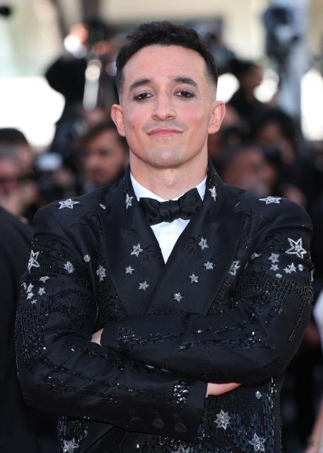 French Youtuber Tibo InShape  arrives for the screening of the film "Karma" at the 79th edition of the Cannes Film Festival in Cannes, southern France on May 15, 2026. (Photo by Sameer AL-DOUMY / AFP)