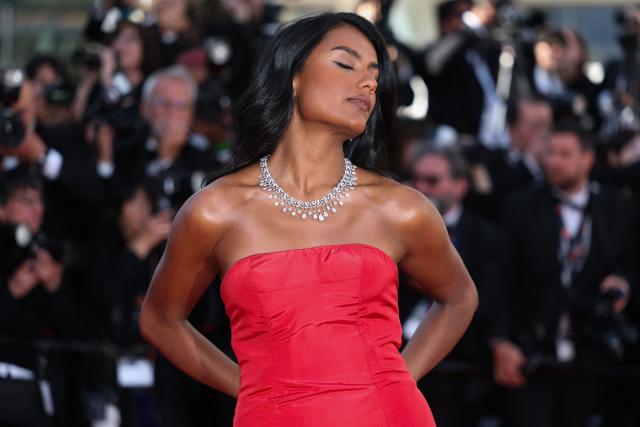 British actress Simone Ashley arrives for the screening of the film "Karma" at the 79th edition of the Cannes Film Festival in Cannes, southern France on May 15, 2026. (Photo by Sameer AL-DOUMY / AFP)