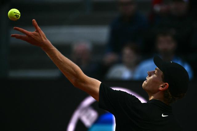 Italy's Jannik Sinner serves to Russia's Daniil Medvedev during their semi-final at the ATP Rome Open tennis tournament at Foro Italico in Rome on May 15, 2026. (Photo by Filippo MONTEFORTE / AFP)