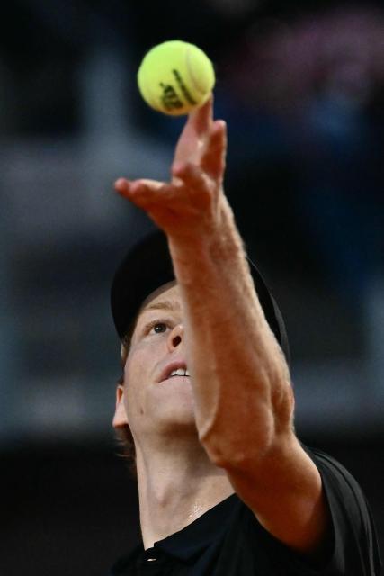 Italy's Jannik Sinner serves to Russia's Daniil Medvedev during their semi-final at the ATP Rome Open tennis tournament at Foro Italico in Rome on May 15, 2026. (Photo by Filippo MONTEFORTE / AFP)