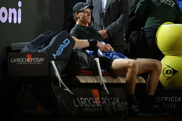 Italy's Jannik Sinner reacts during a break in the semi-final against Russia's Daniil Medvedev at the ATP Rome Open tennis tournament at Foro Italico in Rome on May 15, 2026. (Photo by Tiziana FABI / AFP)