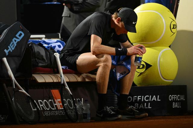 Italy's Jannik Sinner reacts during a break in the semi-final against Russia's Daniil Medvedev at the ATP Rome Open tennis tournament at Foro Italico in Rome on May 15, 2026. (Photo by Tiziana FABI / AFP)