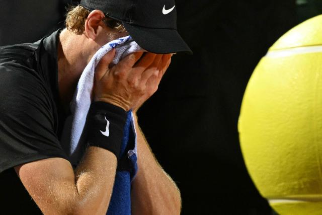 Italy's Jannik Sinner reacts during a break in the semi-final against Russia's Daniil Medvedev at the ATP Rome Open tennis tournament at Foro Italico in Rome on May 15, 2026. (Photo by Tiziana FABI / AFP)