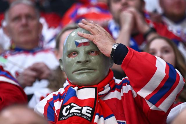 A Czech Republic supporter reacts in the stands ahead of the group B match between Czech Republic and Denmark at the IIHF Ice Hockey Men's World Championship in the BFC Arena, Fribourg, on May 15, 2026. (Photo by Fabrice COFFRINI / AFP)