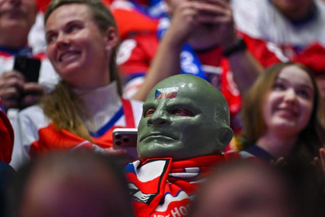 A Czech Republic supporter looks on in the stands ahead of the group B match between Czech Republic and Denmark at the IIHF Ice Hockey Men's World Championship in the BFC Arena, Fribourg, on May 15, 2026. (Photo by Fabrice COFFRINI / AFP)