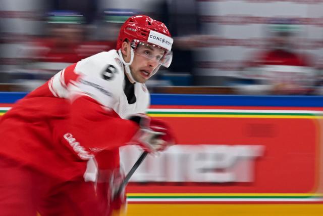 Denmark's forward #6 Oliver Kjaer looks on as he skates during the group B match between Czech Republic and Denmark at the IIHF Ice Hockey Men's World Championship in the BFC Arena, Fribourg, on May 15, 2026. (Photo by Fabrice COFFRINI / AFP)