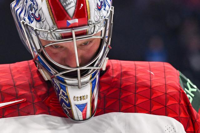 Czech Republic's goalkeeper #32 Josef Korenar concentrates during the group B match between Czech Republic and Denmark at the IIHF Ice Hockey Men's World Championship in the BFC Arena, Fribourg, on May 15, 2026. (Photo by Fabrice COFFRINI / AFP)