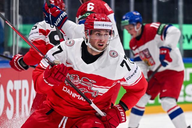 Denmark's forward #77 Mathias From looks on as he skates during the group B match between Czech Republic and Denmark at the IIHF Ice Hockey Men's World Championship in the BFC Arena, Fribourg, on May 15, 2026. (Photo by Fabrice COFFRINI / AFP)
