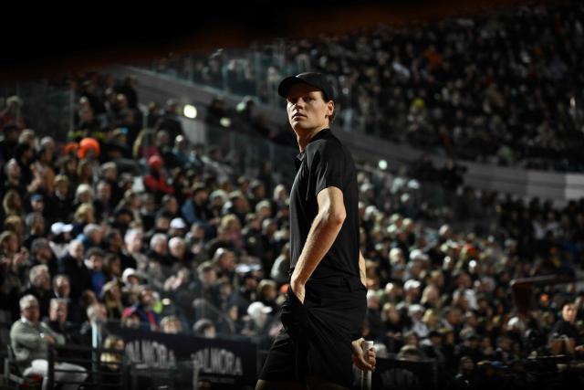 TOPSHOT - Italy's Jannik Sinner prepares to serve against Russia's Daniil Medvedev during their semi-final at the ATP Rome Open tennis tournament at Foro Italico in Rome on May 15, 2026. (Photo by Tiziana FABI / AFP)