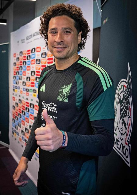 Mexico's football team goalkeeper Guillermo Ochoa gives his thumb up while leaving a mixed zone before a training session in Mexico City on May 15, 2026. (Photo by CARL DE SOUZA / AFP)