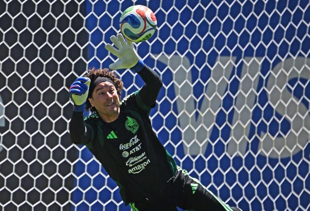 Mexico's football team goalkeeper Guillermo Ochoa stops a ball during a training session in Mexico City on May 15, 2026. (Photo by CARL DE SOUZA / AFP)