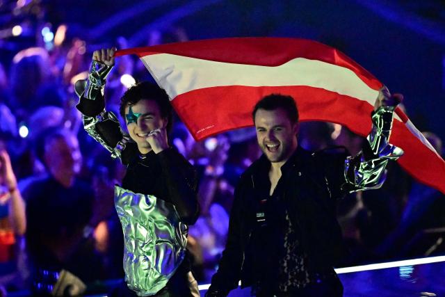 Austria's singer Benjamin Gedeon (L) arrives on stage for the dress rehearsal for the grand final of the Eurovision Song Contest 2026 (ESC) at Wiener Stadthalle in Vienna, Austria on May 15, 2026. (Photo by Tobias SCHWARZ / AFP)