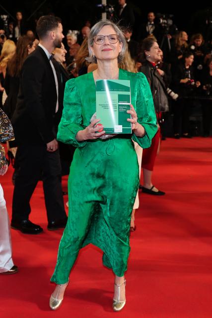 Ecologiste et Social's MP Sandrine Rousseau arrives for the screening of the film "Gentle Monster" at the 79th edition of the Cannes Film Festival in Cannes, southern France on May 15, 2026. (Photo by Thibaud MORITZ / AFP)