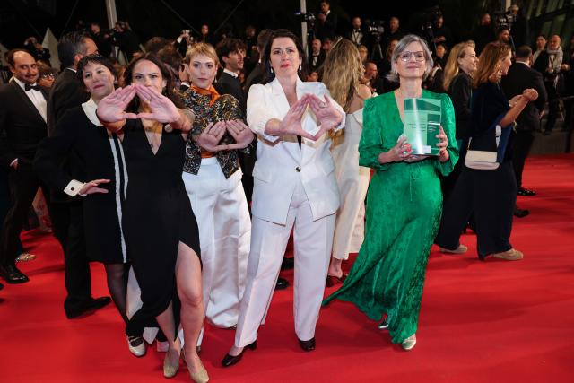 Ecologiste et Social's MP Sandrine Rousseau (R) arrives for the screening of the film "Gentle Monster" at the 79th edition of the Cannes Film Festival in Cannes, southern France on May 15, 2026. (Photo by Thibaud MORITZ / AFP)
