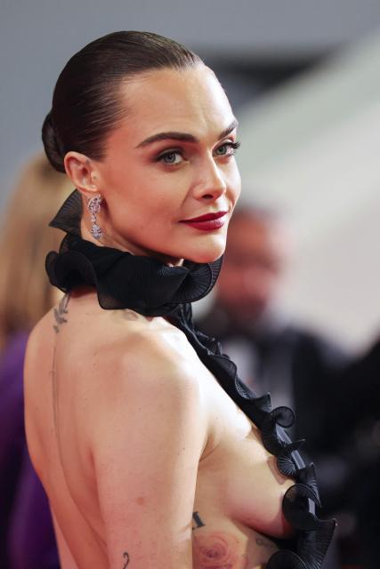 British model Cara Delevingne arrives for the screening of the film "Club Kid" at the 79th edition of the Cannes Film Festival in Cannes, southern France on May 15, 2026. (Photo by Thibaud MORITZ / AFP)