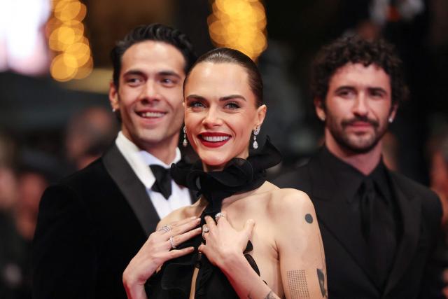 Mexican actor Diego Calva, British model Cara Delevingne and US director and screenwriter Jordan Firstman arrive for the screening of the film "Club Kid" at the 79th edition of the Cannes Film Festival in Cannes, southern France on May 15, 2026. (Photo by Thibaud MORITZ / AFP)