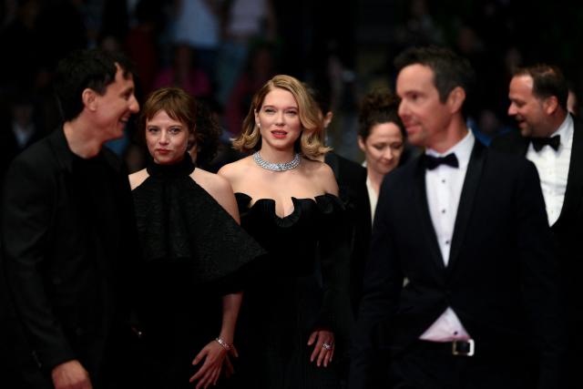 German actress Jella Haase (2ndL) and French actress Lea Seydoux (C) arrive for the screening of the film "Gentle Monster" at the 79th edition of the Cannes Film Festival in Cannes, southern France on May 15, 2026. (Photo by Olivier CHASSIGNOLE / AFP)