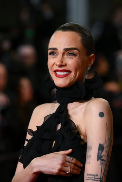 British model Cara Delevingne arrives for the screening of the film "Club Kid" at the 79th edition of the Cannes Film Festival in Cannes, southern France on May 15, 2026. (Photo by Olivier CHASSIGNOLE / AFP)