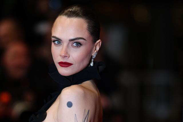 British model Cara Delevingne arrives for the screening of the film "Club Kid" at the 79th edition of the Cannes Film Festival in Cannes, southern France on May 15, 2026. (Photo by Sameer AL-DOUMY / AFP)
