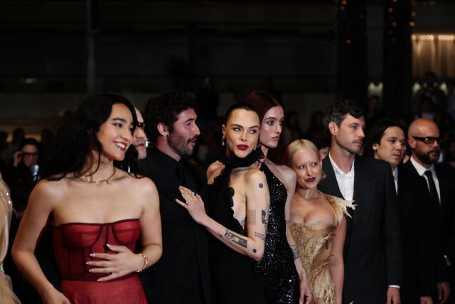 (From L) US actress Miss Benny, US director and screenwriter Jordan Firstman, British model Cara Delevingne, and US producer Alex Coco  arrive for the screening of the film "Club Kid" at the 79th edition of the Cannes Film Festival in Cannes, southern France on May 15, 2026. (Photo by Sameer AL-DOUMY / AFP)