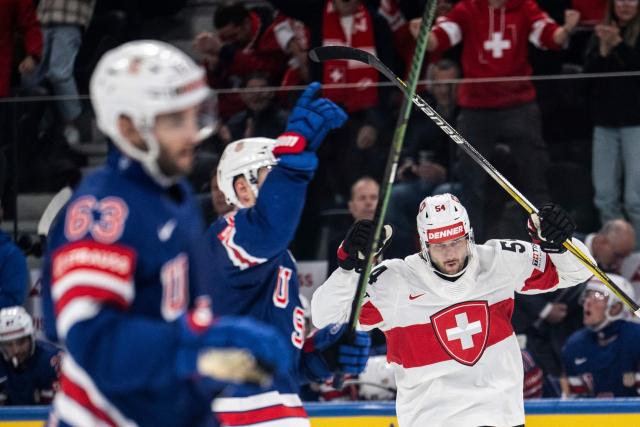 Switzerland's defender #54 Christian Marti reacts during the IIHF Ice Hockey Men's World Championship first round group A ice hockey match between USA and Switzerland at the Swiss Life Arena, in Zurich, on May 15, 2026. (Photo by ENNIO LEANZA / AFP)