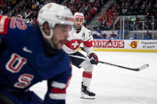 Switzerland's forward #22 Nino Niederreiter reacts during the IIHF Ice Hockey Men's World Championship first round group A ice hockey match between USA and Switzerland at the Swiss Life Arena, in Zurich, on May 15, 2026. (Photo by ENNIO LEANZA / AFP)