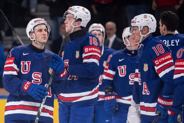 USA's team players react at the end of the IIHF Ice Hockey Men's World Championship first round group A ice hockey match between USA and Switzerland at the Swiss Life Arena, in Zurich, on May 15, 2026. Switzerland wins 3 - 1 against the USA. (Photo by ENNIO LEANZA / AFP)