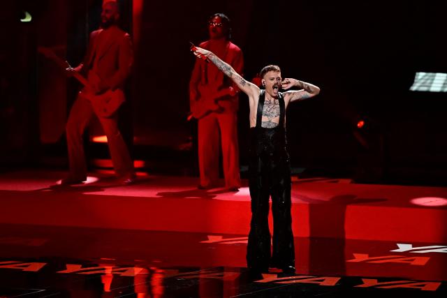 Norwegian singer Jonas Lovv, representing Norway with the song 'Ya Ya Ya', performs during the dress rehearsal for the grand final of the Eurovision Song Contest 2026 (ESC) at Wiener Stadthalle in Vienna, Austria on May 15, 2026. (Photo by Tobias SCHWARZ / AFP)