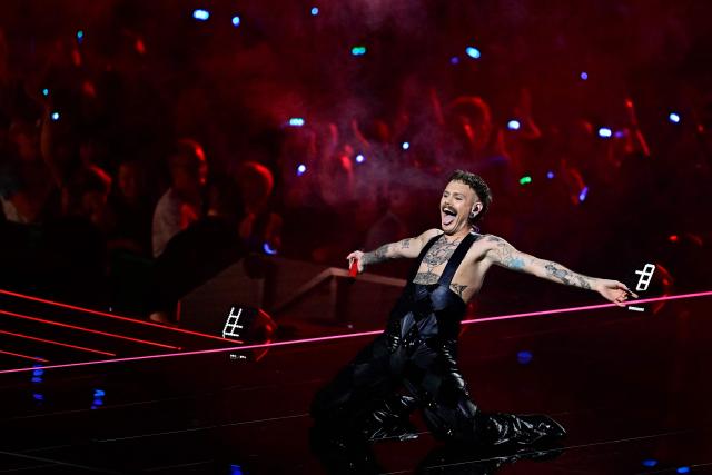 Norwegian singer Jonas Lovv, representing Norway with the song 'Ya Ya Ya', performs during the dress rehearsal for the grand final of the Eurovision Song Contest 2026 (ESC) at Wiener Stadthalle in Vienna, Austria on May 15, 2026. (Photo by Tobias SCHWARZ / AFP)