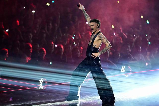 Norwegian singer Jonas Lovv, representing Norway with the song 'Ya Ya Ya', performs during the dress rehearsal for the grand final of the Eurovision Song Contest 2026 (ESC) at Wiener Stadthalle in Vienna, Austria on May 15, 2026. (Photo by Tobias SCHWARZ / AFP)