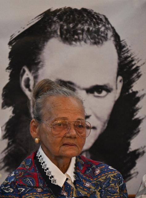 Carmen Navas, the mother of the late political prisoner Victor Quero Navas, attends a mass in his honor in Caracas on May 15, 2026. Venezuela's prisons ministry last May 7 acknowledged the death in custody of political prisoner Victor Hugo Quero Navas, 51, nearly a year after his passing and after his mother spent months searching for him. (Photo by Juan BARRETO / AFP)