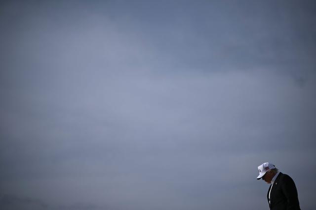 US President Donald Trump steps off of Air Force One upon arrival at Joint Base Andrews in Maryland on May 15, 2026. Trump is returning from Beijing where he met with Chinese President Xi Jinping to discuss trade deals in various sectors. (Photo by Brendan SMIALOWSKI / AFP)