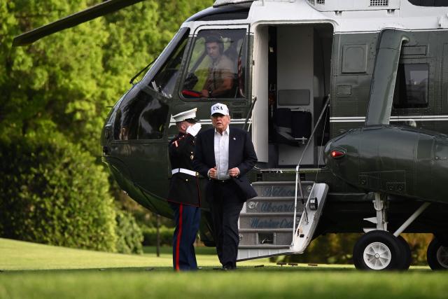 US President Donald Trump walks from Marine One upon arrival on the South Lawn of the White House in Washington, DC, on May 15, 2026. Trump is returning from Beijing where he met with Chinese President Xi Jinping to discuss trade deals in various sectors. (Photo by Alex WROBLEWSKI / AFP)