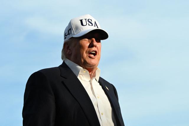 US President Donald Trump speaks to reporters after arriving on the South Lawn of the White House in Washington, DC, on May 15, 2026. Trump is returning from Beijing where he met with Chinese President Xi Jinping to discuss trade deals in various sectors. (Photo by Alex WROBLEWSKI / AFP)