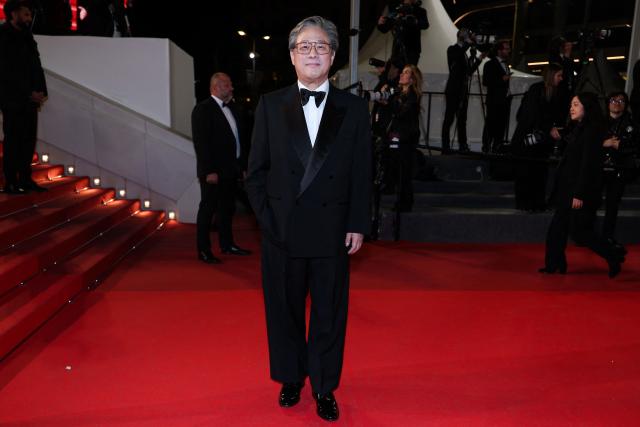 President of the jury South Korean director, screenwriter and producer Park Chan-wook  arrives for the screening of the film "Gun-Che" (Colony) at the 79th edition of the Cannes Film Festival in Cannes, southern France on May 15, 2026. (Photo by Sameer AL-DOUMY / AFP)
