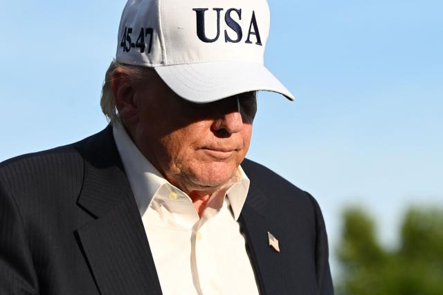 US President Donald Trump walks on the South Lawn of the White House in Washington, DC, on May 15, 2026. Trump is returning from Beijing where he met with Chinese President Xi Jinping to discuss trade deals in various sectors. (Photo by Alex WROBLEWSKI / AFP)