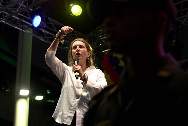 Colombia's presidential candidate Paloma Valencia, of the Centro Democratico party, addresses supporters during a campaign rally in Cali, Colombia on May 15, 2026. Colombia will hold presidential elections on May 31. (Photo by JOAQUIN SARMIENTO / AFP)