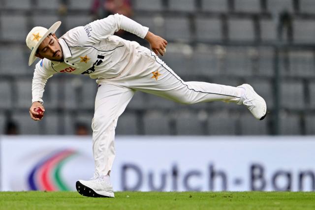 Pakistan’s Azan Awais fields the ball during the first day of the second Test cricket match between Bangladesh and Pakistan at the Sylhet International Cricket Stadium in Sylhet on May 16, 2026. (Photo by MUNIR UZ ZAMAN / AFP)