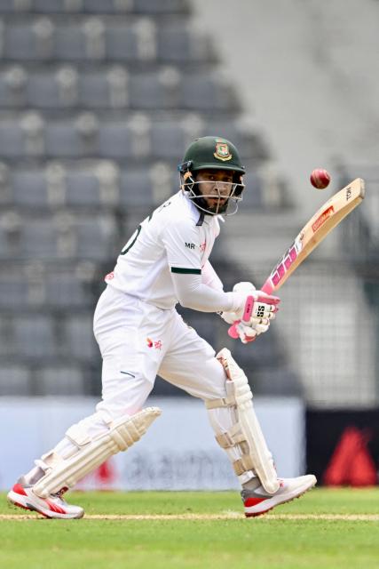 Bangladesh’s Mushfiqur Rahim watches the ball after playing a shot during the first day of the second Test cricket match between Bangladesh and Pakistan at the Sylhet International Cricket Stadium in Sylhet on May 16, 2026. (Photo by Munir UZ ZAMAN / AFP)