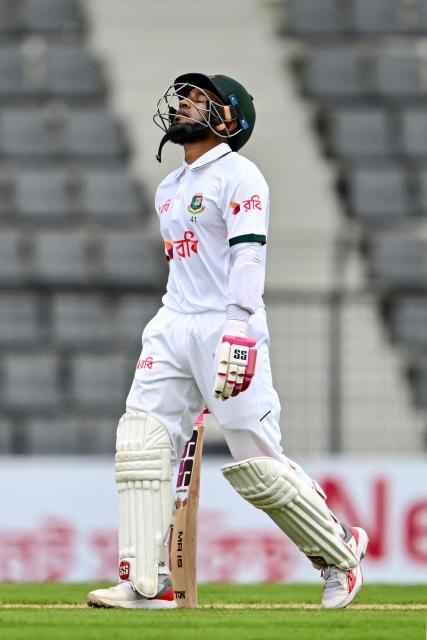 Bangladesh’s Mushfiqur Rahim walks back to the pavilion after his dismissal Pakistan’s Khurram Shahzad during the first day of the second Test cricket match between Bangladesh and Pakistan at the Sylhet International Cricket Stadium in Sylhet on May 16, 2026. (Photo by Munir UZ ZAMAN / AFP)