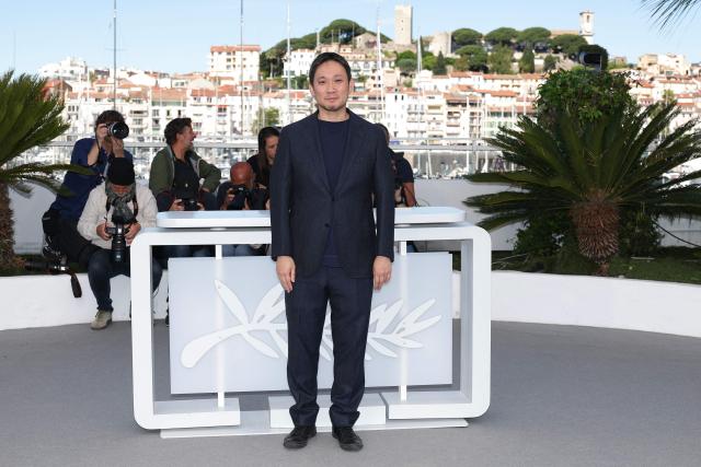 Japanese director and screenwriter Ryusuke Hamaguchi poses during a photocall of the film "Soudain" (All of a Sudden) at the 79th edition of the Cannes Film Festival in Cannes, southern France on May 16, 2026. (Photo by Sameer AL-DOUMY / AFP)