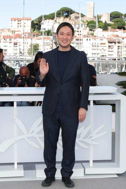 Japanese director and screenwriter Ryusuke Hamaguchi poses during a photocall of the film "Soudain" (All of a Sudden) at the 79th edition of the Cannes Film Festival in Cannes, southern France on May 16, 2026. (Photo by Sameer AL-DOUMY / AFP)