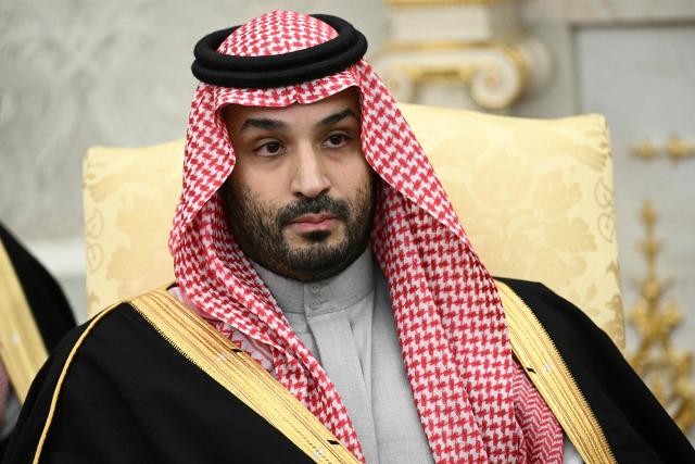 (FILES) Crown Prince and Prime Minister of the Kingdom of Saudi Arabia Mohammed bin Salman looks on during a meeting with US President Donald Trump (not pictured) in the Oval Office of the White House in Washington, DC on November 18, 2025. A French judge in Paris will launch an investigation following a complaint filed against Saudi Crown Prince Mohammed bin Salman regarding the disappearance of Saudi journalist Jamal Khashoggi, who was murdered in 2018 at the Saudi consulate in Istanbul, multiple sources told AFP on May 16, 2026 (Photo by Brendan SMIALOWSKI / AFP)