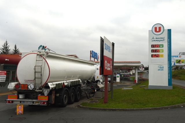 (FILES) This photograph taken on January 18 2022, shows a tank truck delivering supplies at a Super U petrol station Ustaritz, southwestern France. The French government has authorised the movement of tanker trucks throughout the weekend to ‘ensure the continuity of fuel supplies’ to petrol stations, according to a decree published in the Official Journal on May 16. 2026. (Photo by GAIZKA IROZ / AFP)