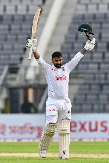 Bangladesh’s Litton Das celebrates after scoring a century (100 runs) during the first day of the second Test cricket match between Bangladesh and Pakistan at the Sylhet International Cricket Stadium in Sylhet on May 16, 2026. (Photo by Munir UZ ZAMAN / AFP)