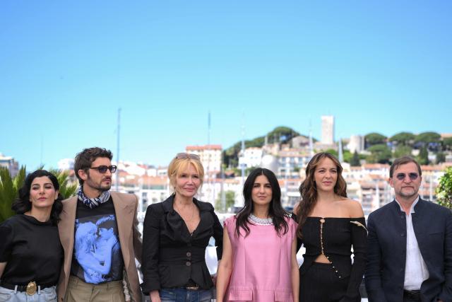 (From L) Iranian actress Mina Kavani, French-Canadian actor Niels Schneider, French actress Clementine Celarie, French director Geraldine Nakache, Canadian actress Monia Chokri and Belgian producer Patrick Quinet pose during a photocall of the film "Si tu penses bien" at the 79th edition of the Cannes Film Festival in Cannes, southern France on May 16, 2026. (Photo by Olivier CHASSIGNOLE / AFP)