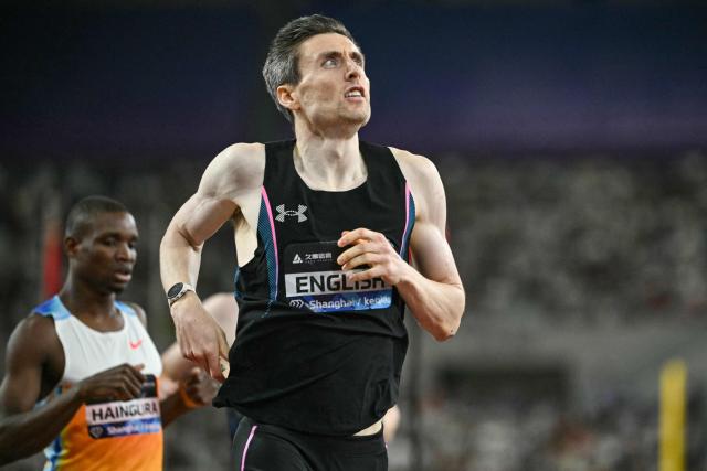 Ireland's Mark English celebrates winning the men's 800m event and breaking the meeting's record during the Shanghai/Keqiao Diamond League athletics meeting in Keqiao, Shaoxing in China's eastern Zhejiang province on May 16, 2026. (Photo by HECTOR RETAMAL / AFP)