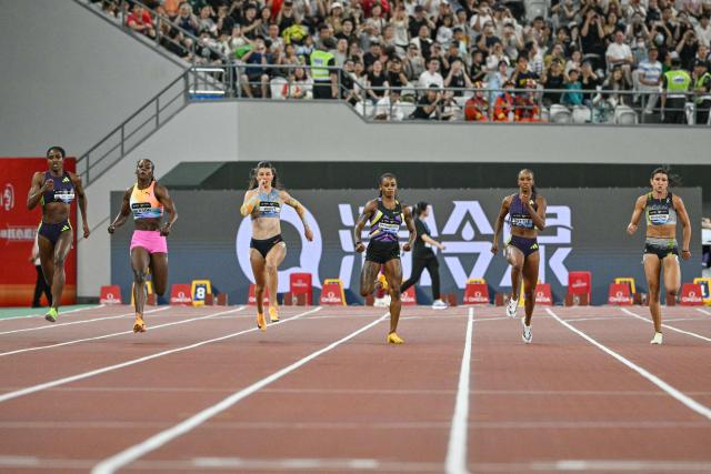 Athletes compete in the women's 200m event during the Shanghai/Keqiao Diamond League athletics meeting in Keqiao, Shaoxing in China's eastern Zhejiang province on May 16, 2026. (Photo by HECTOR RETAMAL / AFP)