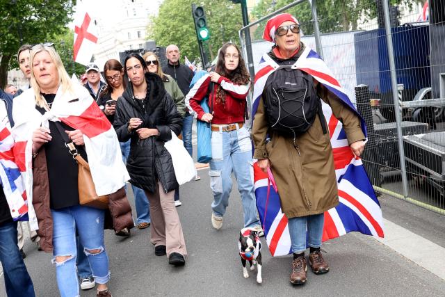 Supporters of British far-right activist Tommy Robinson, real name Stephen Yaxley-Lennon, take part in a march organised by United The Kingdom, in central London on May 16, 2026. (Photo by Toby Shepheard / AFP)